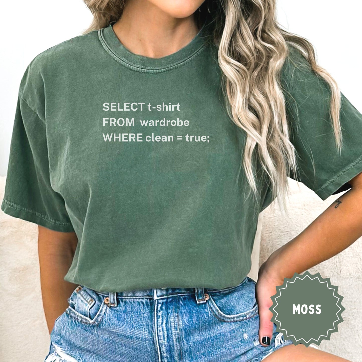 Green t-shirt with "SELECT t-shirt FROM wardrobe WHERE clean = true;" text.