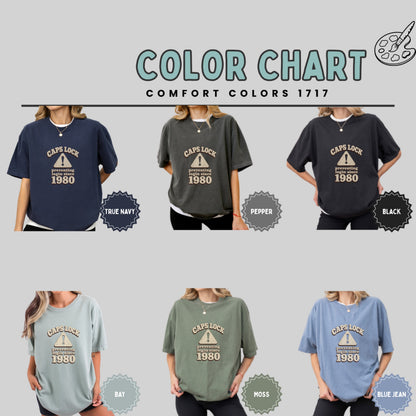 Six t-shirts in different colors, featuring "Caps Lock" design.