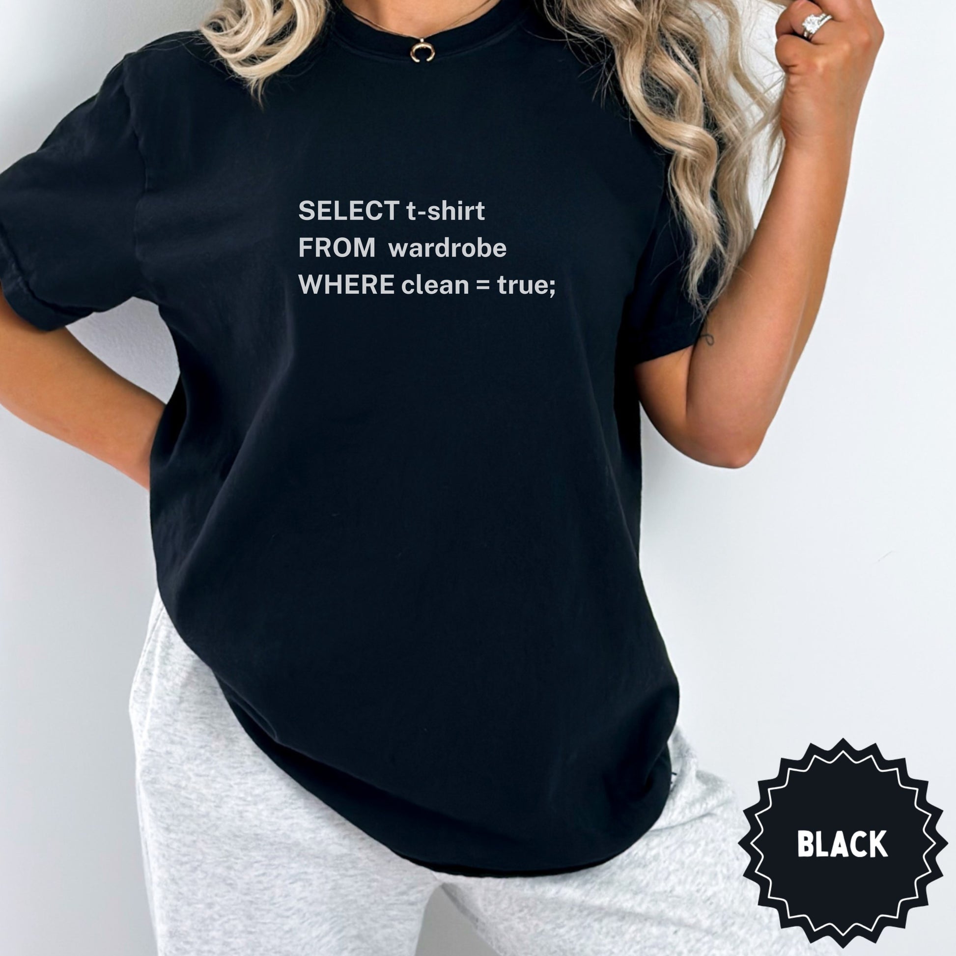 Black t-shirt with white text: "SELECT t-shirt FROM wardrobe WHERE clean = TRUE;"