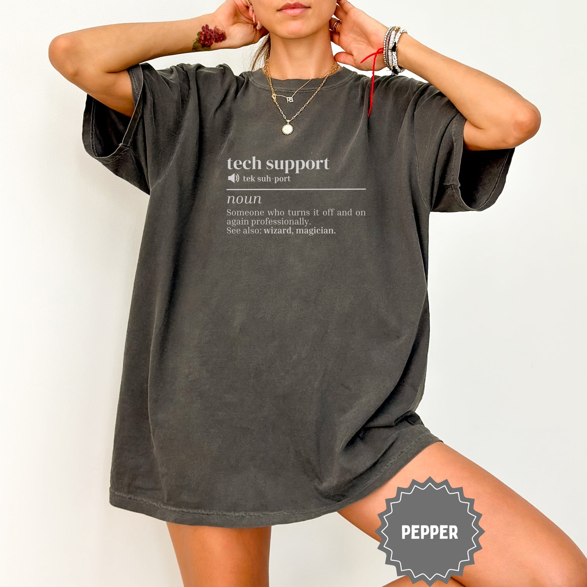 Dark grey t-shirt with "tech support" definition in white text.