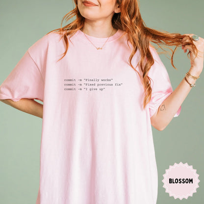 Pink T-Shirt with Programmer Commit Messages