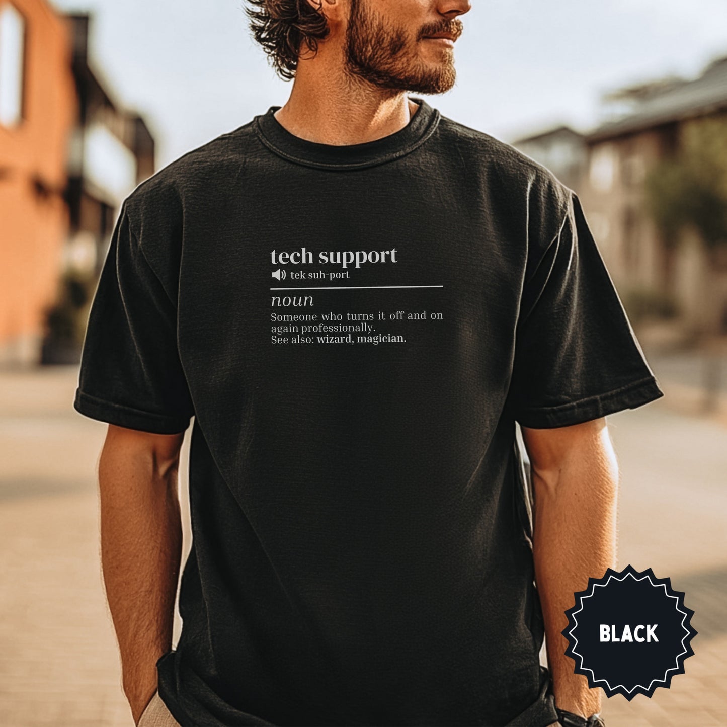 Black t-shirt with "tech support" definition: "Someone who turns it off and on again professionally."